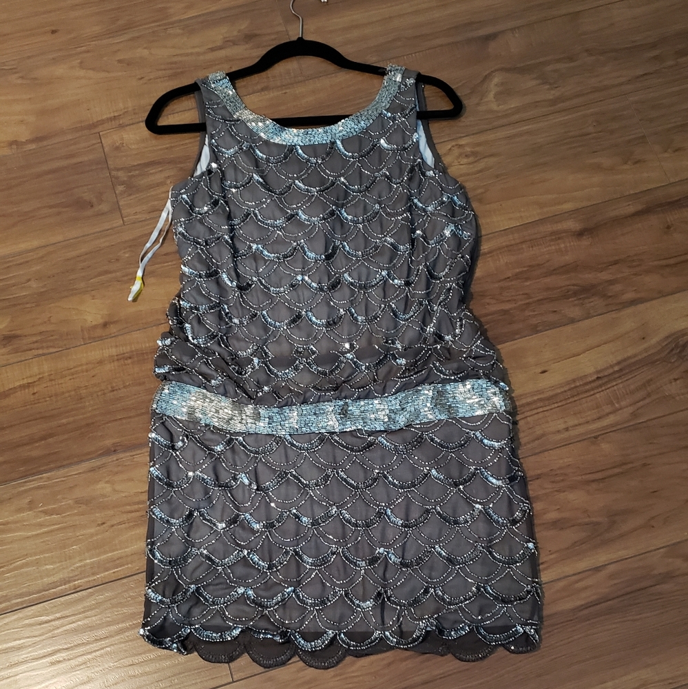 Adrianna Papell dress.